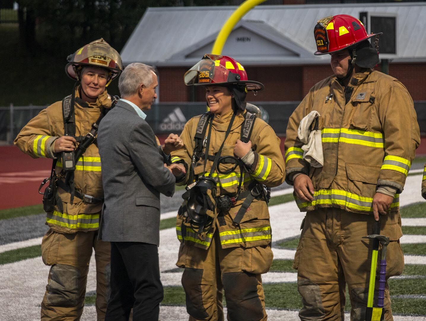 Jasinski shaking hands